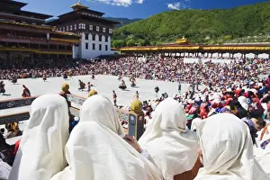 Bhutan Prints: Spectators watching the Autumn Tsechu (festival) at Trashi Chhoe Dzong