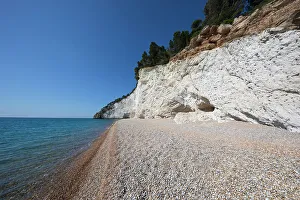 Puglia Prints: Spiaggia di Vignanotica pebble beach under a white cliff