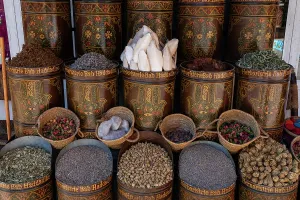 Stalls Prints: Spices and herbs displayed in baskets at a market in Marrakech