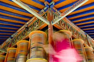 Spinning prayer wheels, Xiahe monastery, Xiahe, Gansu, China, Asia