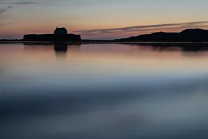 Back Lit Prints: St. Cwyfan's Church (Eglwys Cwyfan) at dusk