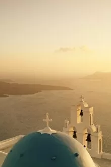 St. Gerasimos Church with blue dome at sunset, Firostefani, Santorini, Cyclades, Aegean Sea, Greek Islands, Greece