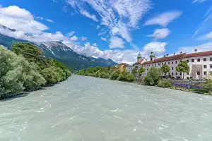Freshness Prints: St. Jakob Cathedral view with colorful buildings and River Inn under clear summer sky in Tyrol Region of Austria