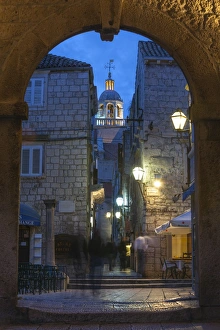 Korcula Prints: St. Marko Bell Tower and Land Gate illuminated at dusk