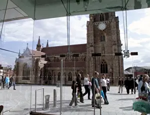 Midland Prints: St. Martins in the Field church visible through glass window of shopping complex