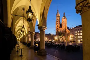 Basilica Prints: St. Marys Church (St. Marys Basilica) and main square illuminated at dawn, UNESCO