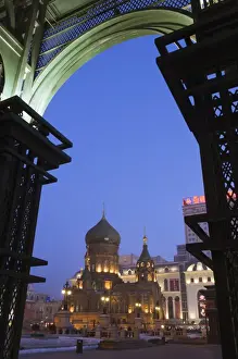 Illuminating Prints: St. Sophia Russian Orthodox Church seen through arches illuminated at night