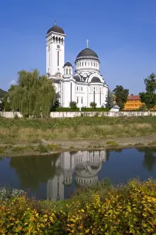 Orthodox Church Prints: St. Treime Orthodox church on the banks of the river Tarnava Mare in the medieval citadel town