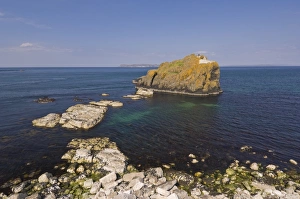 Images Dated 24th May 2008: Stackaboy Island in Larrybane Bay with Rathlin Island in the background