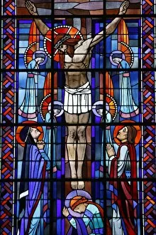 Stained glass of the Crucifixion in Notre Dame du Rosaire Catholic church