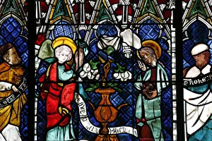 Stained glass window dating from the 14th century depicting the Announcement made to Mary Stained glass window dating from the 14th century depicting the Announcement made to Mary