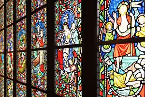 Aesthetic Prints: Stained glass windows showcase detailed artwork in House of Western Art in Otaru