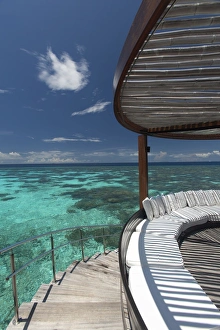 Stripe Prints: Stairs to the beach and sofa overlooking the ocean, Maldives, Indian Ocean, Asia