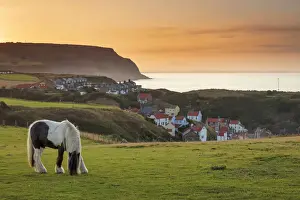 York Prints: Staithes fishing village and distant Boulby Cliffs on the North Yorkshire Heritage