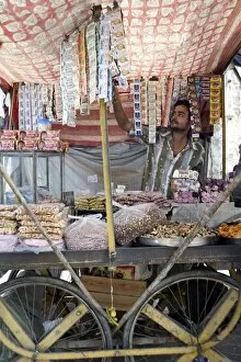 Images Dated 11th October 2009: Stall holder selling gutka, namkeen snacks and bidi cigarettes, Kishangarh
