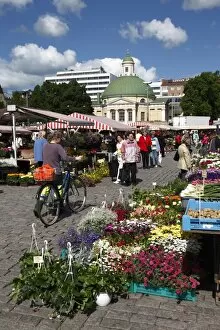 Stalls in Kauppatori Square (Market Square) and Orthodox church behind