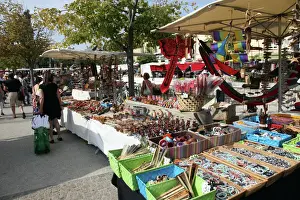 Large Group Of Objects Prints: Stalls in the street market held every Sunday in Ile sur la Sorgue