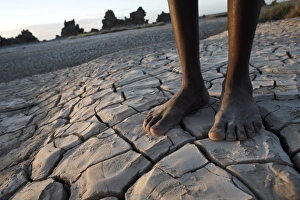 Lower Body Prints: Standing in the desolate landscape of Lac Abbe, Djibouti, Africa