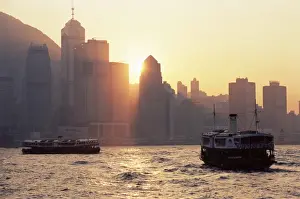 Arrive Prints: Star ferries, Victoria Harbour and Hong Kong Island skyline at sunset, Hong Kong
