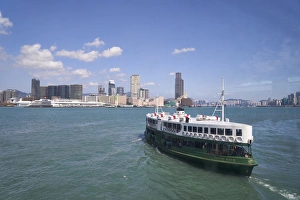 Kowloon Prints: Star Ferry sailing towards the Kowloon side of Victoria Harbour, Hong Kong, China, Asia