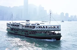 Star Ferry, Victoria Harbour, with Hong Kong Island skyline in mist beyond