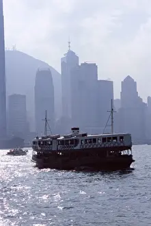 Star Ferry, Victoria Harbour, with Hong Kong Island skyline in mist beyond