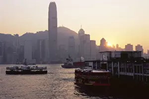 Tall Prints: Star Ferry, Victoria Harbour and skyline of Hong Kong Island at sunset