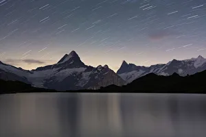 Grindelwald Prints: Star trail in the night sky over Bachalpsee lake, Grindelwald, Bernese Oberland