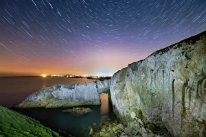 Natural Arch Prints: Star trails and night sky over Bwa Gwyn or the White Arch