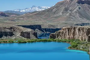 National Prints: Stark blue lake surrounded by mountains in Band-e-Amir National Park in Afghanistan with clear skies and rugged terrain