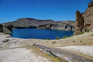Ecology Prints: Stark blue lake surrounded by rocky cliffs in Band-e-Amir National Park in Afghanistan's natural landscape
