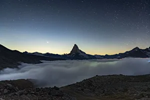 Spiral Galaxy Prints: Starry night over Matterhorn in the mist, Zermatt, Valais Canton, Swiss Alps, Switzerland