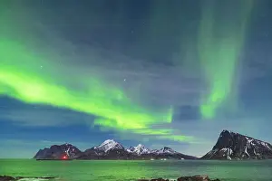 Vestvagoy Prints: Starry sky with Aurora Borealis (Northern Lights) over mountains and cold sea
