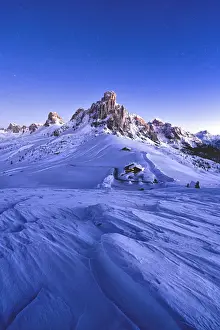 Belluno Province Prints: Starry sky at dusk on Ra Gusela mountain surrounded by fresh snow, Giau Pass, Dolomites