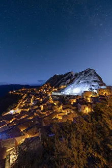 Basilicata Prints: Stars in the night sky over the medieval town of Pietrapertosa, Dolomiti Lucane