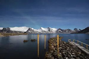 Starry Sky Prints: Stars of the polar night frame the frozen sea surrounded by snowy peaks, Mefjord Berg