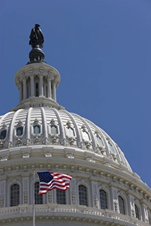 Nationalism Prints: Stars and Stripes flag in front of the dome of the U. S. Capitol Building, Washington D