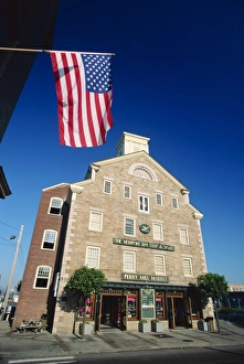 Newport Prints: The Stars and Stripes flying before the Newport Bay Club and Hotel