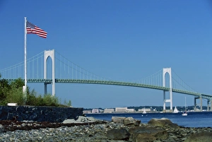 Rhode Island Prints: The Stars and Stripes flying before the Newport Bridge