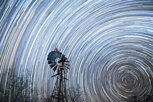 Nighttime Prints: Startrail with windmill in foreground, Timbavati, South Africa, Africa