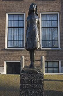 Statue of Anne Frank outside Westerkerk church, Amsterdam, Netherlands, Europe
