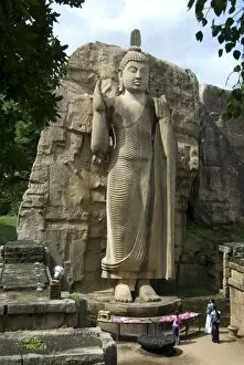 Statue of Buddha, 12 metres tall, carved in granite, Aukana, north of Dambulla