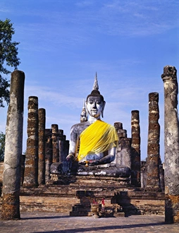 Wat Mahathat Prints: Statue of the Buddha With Religious Offerings, Wat Mahathat, Sukothai, Thailand