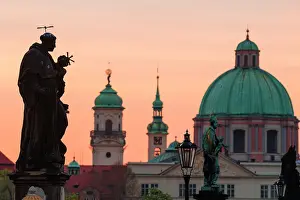 Priest Prints: Statue at Charles Bridge with a dome of St