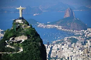 Sea Scape Collection: Statue of Christ the Redeemer overlooking city and Sugar Loaf mountain