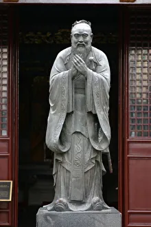 Shanghai Prints: Statue of Confucius in the Shanghai Confucius temple, Shanghai, China, Asia