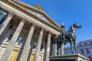 Sights Prints: Statue of Duke of Wellington with a traffic cone on its head outside Glasgow Museum of Modern Art in Scotland during