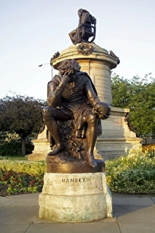 Statue of Hamlet with statue of Ronald Gower behind, Stratford-upon-Avon