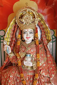 Sculptures Prints: Statue of the Hindu goddess Annapurna (Parvati) giving food, Lakshman temple