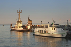 Statue of Imperia by Peter Lenk at the seaport, restaurant on a ship, Konstanz, Lake Constance